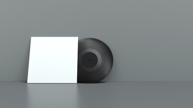 disque vinyle devant sa pochette pos&eacute; contre un mur
