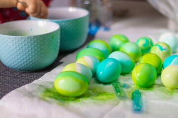 Easter blue and green eggs after coloring with dyes for the Easter holiday