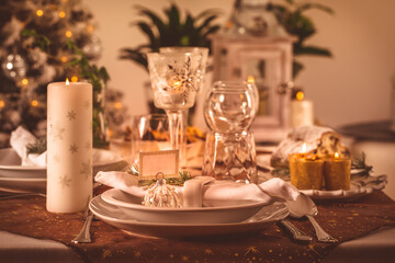 Festive Christmas table in golden tone