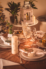 Festive Christmas table in golden tone