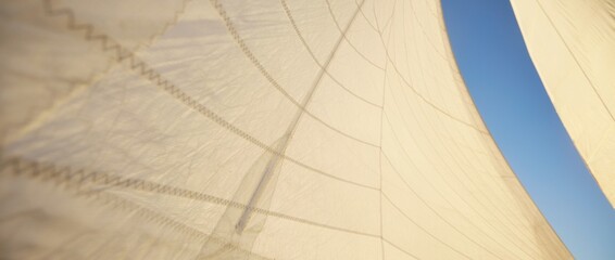 White sails of a sloop rigged yacht against clear blue sky with plane tracks at sunset. Gulf of Finland. Transportation, nautical vessel, sailing, sport, recreation