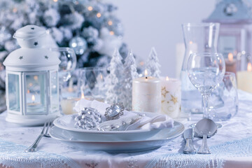 Festive Christmas table in snowy white
