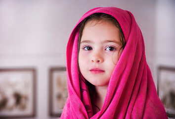 Portrait of girl wearing towel after taking a shower.