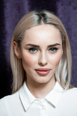 Fototapeta premium Buautiful young blonde woman make up
