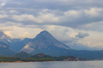 View of the Mediterranean sea coast and the Taurus mountains in Kemer, Antalya province in Turkey
