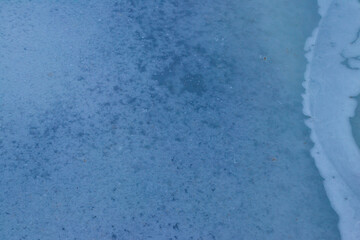 Texture of the ice surface. Winter background
