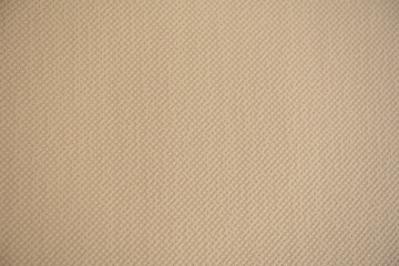 Fototapeta na wymiar Texture de mur beige - papier peint - beige - uni - couleur nude