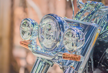 Motorcycle front with beautiful headlights.
