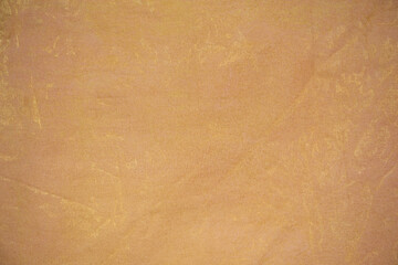 Texture de peinture jaune et dorée - peinture sur tissus - création artistique - abstrait