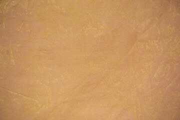 Fototapeta na wymiar Texture de peinture jaune et dorée - peinture sur tissus - création artistique - abstrait