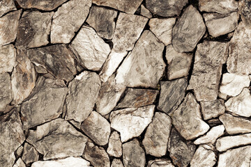 Piedra natural colocada en pared para decoración
 