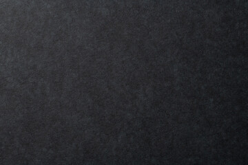 黒いマーブル調の紙の背景テクスチャー