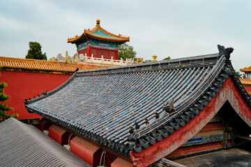 Ancient  chinese architecture. Tiled roof and decoration. Forbidden City, Beijing, China.