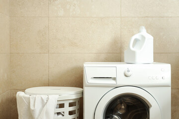 Concept of housework with washing machine in bathroom