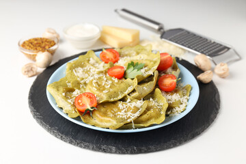 Delicious food concept with ravioli on white background