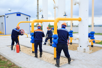 Fototapeta na wymiar Maintenance of the gas pipeline. A specialist checks the gas pipeline.