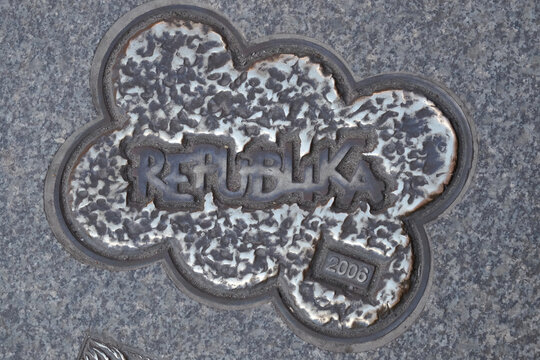 TORUN, POLAND - 07 August 2021: In memory of REPUBLIKA polish famous band label made of iron mounted on  