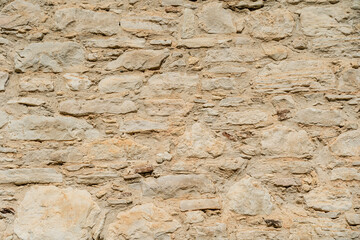 Close up photo of old stone wall. Texture