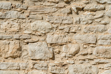 Close up photo of old stone wall. Texture