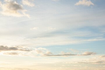 High, fluffy clouds during sunset in the evening.
