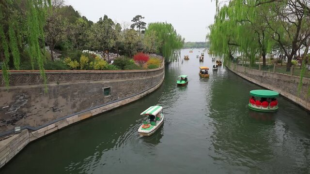 Cruise ships travel in Beihai Park, Beijing