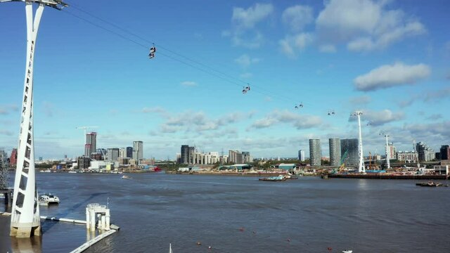Aerial view of Emirates Air Line cable cars. The service is the UK's first urban cable car running across the Thames from the O2 to the Excel centre.