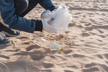 Obraz premium global environment problems conversation, person holding garbage outdoors, cleaning our ecosystem