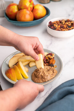 Apples and almond butter for a snack 