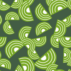 Abstract seamless pattern on green background. Geometrical shapes for textile design.