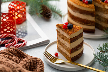 Slice of layer cake. Christmas decoration.