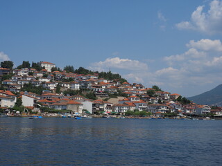 Fototapeta na wymiar The cityscape of Ohrid seen from the Lake Ohrid, North Macedonia