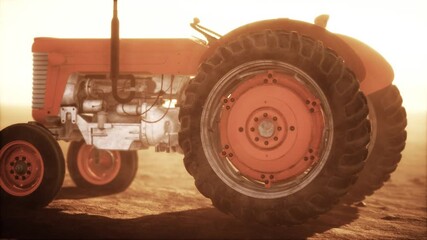vintage retro tractor on a farm in desert