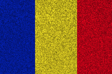 Patriotic glitter background in color of Chad flag