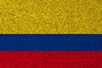 Patriotic glitter background in color of Colombia flag