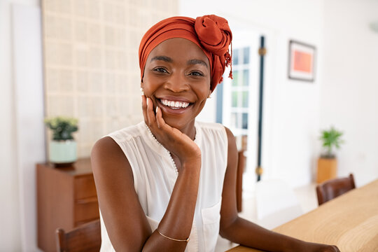 Smiling African Mature Woman Wearing Traditional Headscarf