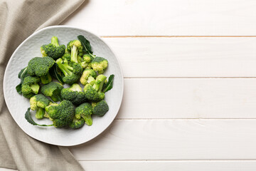 broccoli of fresh green broccoli in bowl over coloredbackground. , close up. Fresh vegetable