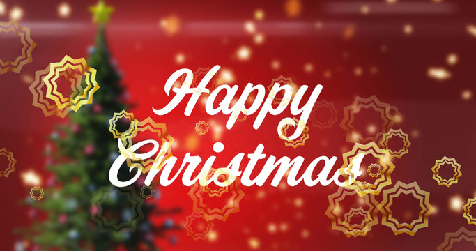 Image of happy christmas text in white, with gold stars over christmas tree on red background