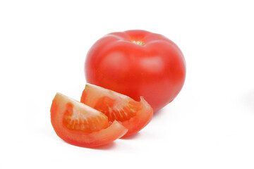 ripe red tomatoes lie isolated on a white background