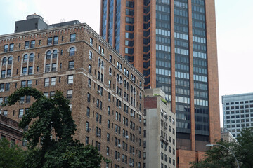 A Variety of Old Buildings and Skyscrapers along a Street in Murray Hill of New York City