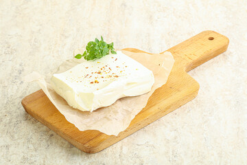 Greek Feta cheese over board