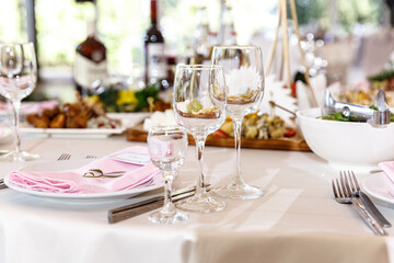 Table setting for an event party or wedding in the restaurant decorated 