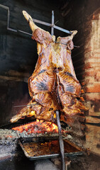 Grilled lamb roasted on the cross. 