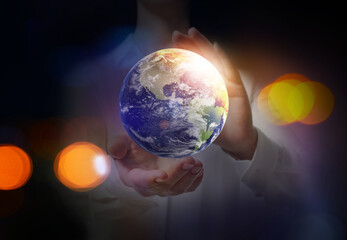 World in our hands. Woman holding digital model of Earth, closeup view