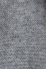 Texture de tricot en laine gris chiné