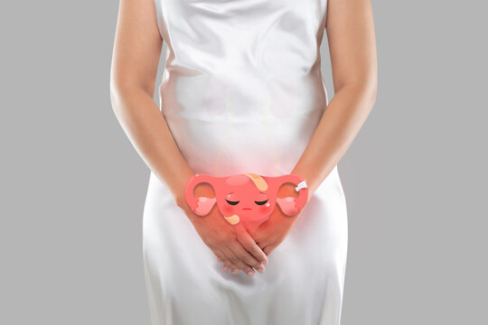 Illustration of the uterus is on the woman's body