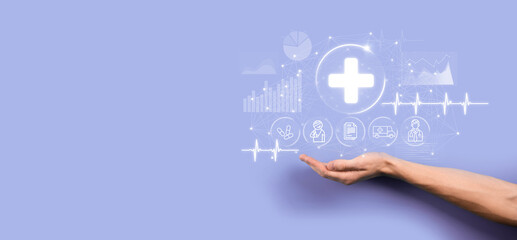 Businessman hold virtual plus medical network connection icons. Covid-19 pandemic develop people awareness and spread attention on their healthcare.Doctor,document,medicine,ambulance,patient icon.