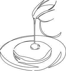 pancake poured with syrup