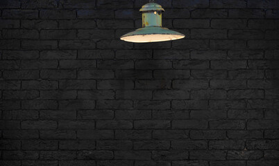 vintage street lamp, black brick wall