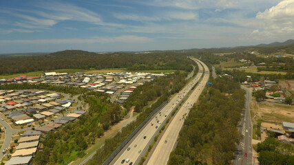 Fototapeta na wymiar Traffic Aerial Ormeau M1 Motorway Highway towards Gold Coast, Queensland, Australia 