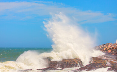 Rocky coastline on Diaz Point with power sea wave - Luederitz, Namibia
